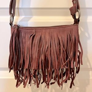 Fringe crossbody bag. Maroon. Barely used. Good condition.